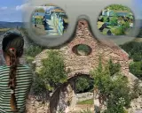 Dziewczynka patrzy na ruiny, wyobrażając sobie dawne osieczna atrakcje. Widok na historyczne budynki i krajobraz.