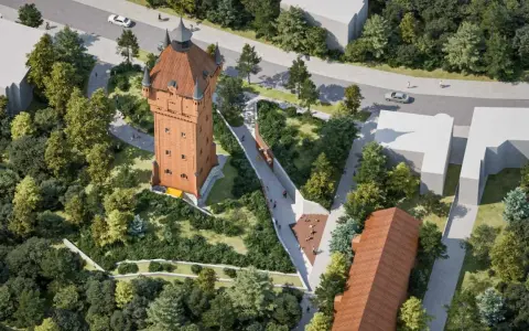 Nowoczesna aranżacja terenu wokół wieży ciśnień w Śremie. Spacerowicze cieszą się zielenią i architekturą.