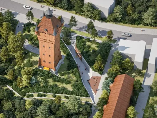 Nowoczesna aranżacja terenu wokół wieży ciśnień w Śremie. Spacerowicze cieszą się zielenią i architekturą.